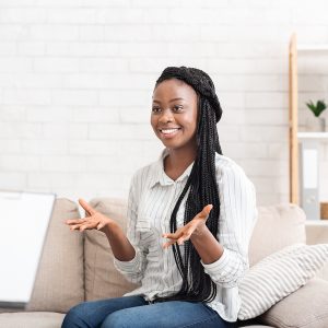 Black woman with braids on cream couch with hands facing up while talking. More information about counseling in Cleveland area. 44122. We help with depression, axnetiy, self-esteem, grief, PTSD. We offer EMDR, couples counseling. Counseling for Black Girls and more. Feel free to reach out to us for more questions. We are located in northeast ohio, however we offer online counseling anywhere in Ohio. You do not have to live in Cleveland or Beachwood, to start counseling. It is accessible from your mobile device. 