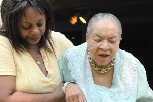 black woman assisting elderly woman. Counseling for caretakers Ohio 44120, Therapy online, Therapy for Black Girls. We can help you manage anxiety, depression, grief and stress. It can be overwhelming caring for a loved one or family member, but we're here to help you make sense of it all. 